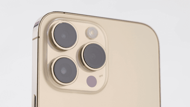 Close-up of a smartphone's rear camera module featuring three lenses and a flash