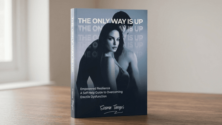 Book titled The Only Way Is Up displayed upright on a wooden table in a softly lit room.