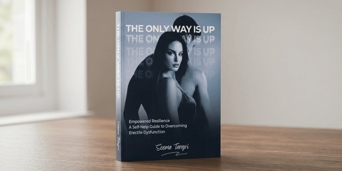Book titled The Only Way Is Up displayed upright on a wooden table in a softly lit room.