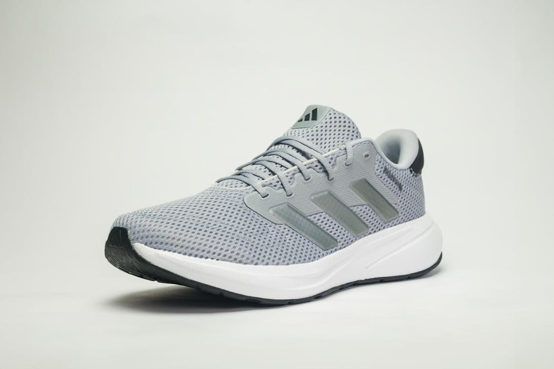 Free Photo Of Stylish Adidas Gray Running Shoe On White Background